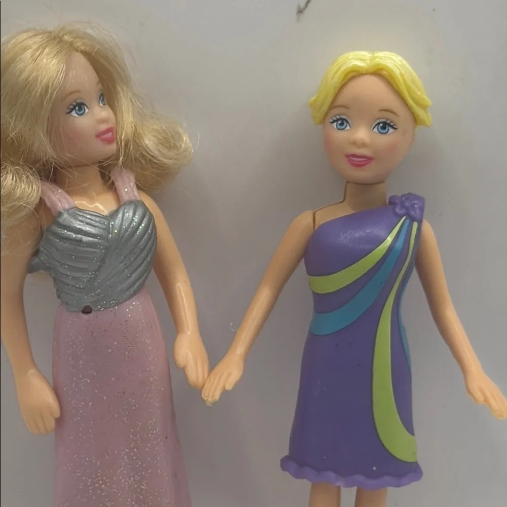 Polly pocket Doll Set with  extra Pink and Purple Dresses